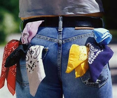 Purple represents the Grape Street Crips, a sub-set of the Crips gang. . What does a green bandana in the back pocket mean
